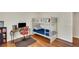 Bedroom with a built-in bunk bed and a desk, perfect for  at 404 Queensbury Pl, Acworth, GA 30102