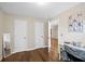 A spacious bedroom with hardwood floors and neutral paint at 404 Queensbury Pl, Acworth, GA 30102