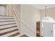 Entryway with a staircase and beautiful wood accents at 404 Queensbury Pl, Acworth, GA 30102