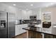Modern kitchen with stainless steel appliances and a convenient center island at 404 Queensbury Pl, Acworth, GA 30102