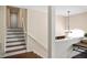 A bright stairway leads to the upper level of this beautiful home at 404 Queensbury Pl, Acworth, GA 30102