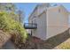 Exterior of home featuring a backyard deck and a sloped yard at 5551 Panola Pl, Lithonia, GA 30058