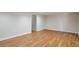 Open basement floor plan with updated flooring and recessed lighting at 5551 Panola Pl, Lithonia, GA 30058