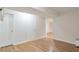 Spacious basement showcasing durable floors, neutral walls, and two utility doors at 5551 Panola Pl, Lithonia, GA 30058