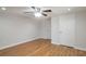 Bedroom featuring a ceiling fan, and neutral walls complimented by hardwood flooring at 5551 Panola Pl, Lithonia, GA 30058