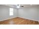 Cozy bedroom with a ceiling fan, and a window for natural light at 5551 Panola Pl, Lithonia, GA 30058