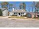 Comfortable home with a manicured front yard, side garage, and convenient street access at 5551 Panola Pl, Lithonia, GA 30058