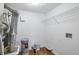 Functional laundry area with essential appliances and storage solutions at 5551 Panola Pl, Lithonia, GA 30058