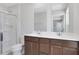 Elegant bathroom with double vanity, modern fixtures, and walk-in shower at 8470 Limerick Lane Dr, Winston, GA 30187
