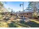 View of the backyard and the back of the home at 2727 Whites Mill Ct, Decatur, GA 30034