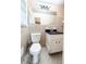 Bathroom featuring a black granite countertop, tiled walls, and neutral walls at 2727 Whites Mill Ct, Decatur, GA 30034