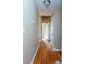 Hallway featuring hardwood floors, neutral walls, and access to various rooms of the house at 2727 Whites Mill Ct, Decatur, GA 30034