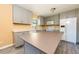 Kitchen with gray cabinets, a large island, and new appliances at 2727 Whites Mill Ct, Decatur, GA 30034