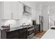 Well-appointed kitchen featuring sleek countertops, stainless steel appliances, and classic tile backsplash, creating a functional design at 273 Glenwood Se Ave # B, Atlanta, GA 30312