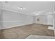Bright and airy living room showcasing a fireplace and neutral tones at 7176 Ravenwood Ln, Lithonia, GA 30038