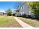 Beautifully maintained home with a covered porch and lush green surroundings at 3582 Ontario Ct, Buford, GA 30519