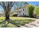 Attractive two-story home featuring a covered porch and landscaped front yard at 3582 Ontario Ct, Buford, GA 30519