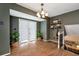 Upstairs hallway with natural light, staircase access and decorative shelving at 3582 Ontario Ct, Buford, GA 30519