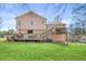 Two-story home with a large backyard, expansive deck, and well-maintained lawn at 38 Wayfaring Ct, Rockmart, GA 30153