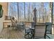 Spacious wooden deck with multiple seating areas and outdoor furniture, perfect for entertaining at 38 Wayfaring Ct, Rockmart, GA 30153