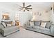 Comfortable living room with neutral tones, plush seating, and abundant natural light at 38 Wayfaring Ct, Rockmart, GA 30153