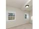 Unfinished basement offers potential for customization with windows and neutral walls at 2480 Miriam Ln, Decatur, GA 30032