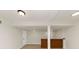 Basement space with brick-based bar and neutral walls at 2480 Miriam Ln, Decatur, GA 30032