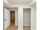 Unfinished basement offers potential for customization with open doorways and neutral walls at 2480 Miriam Ln, Decatur, GA 30032