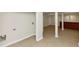 Large unfinished basement with tiled floors and a brick bar at 2480 Miriam Ln, Decatur, GA 30032