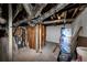 Unfinished basement with insulation and water heater at 2480 Miriam Ln, Decatur, GA 30032