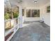 Spacious covered carport with white pillars, providing convenient parking and protection from the elements at 2480 Miriam Ln, Decatur, GA 30032