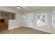 A room with neutral paint and tile flooring featuring an entrance, window, and doorway at 2480 Miriam Ln, Decatur, GA 30032