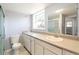 Bathroom featuring a toilet, vanity, and tiled shower at 2666 Frontier Trl, Atlanta, GA 30341