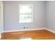 Bedroom showcasing hardwood floors and a bright window at 2666 Frontier Trl, Atlanta, GA 30341