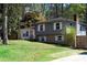 Charming two-story home with well-manicured lawn and classic architectural details at 2666 Frontier Trl, Atlanta, GA 30341