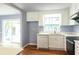 Well-lit kitchen with modern appliances and an open view to the backyard at 2666 Frontier Trl, Atlanta, GA 30341