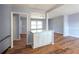 Open living space with seamless transition to adjacent rooms and staircase at 2666 Frontier Trl, Atlanta, GA 30341