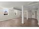 The finished basement features wood-look floors, recessed lighting, and multiple windows at 3376 Irish Ln, Decatur, GA 30032