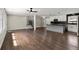 Open-concept living space with hardwood floors, a modern kitchen, and plenty of natural light at 3376 Irish Ln, Decatur, GA 30032