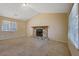 Comfortable living room with neutral carpeting and a stone fireplace offering a warm, inviting space at 1045 Forest Path, Stone Mountain, GA 30088