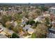 An aerial view displays the property within a residential area, showcasing mature trees and well-kept landscaping at 1109 Pine Grove Ne Ave, Brookhaven, GA 30319