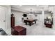 Finished basement featuring a pool table and neutral color palette at 1109 Pine Grove Ne Ave, Brookhaven, GA 30319