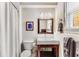 Bathroom featuring shower-tub combo with a wood vanity and sink with a framed mirror at 1109 Pine Grove Ne Ave, Brookhaven, GA 30319