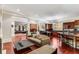Spacious living room open to the kitchen, perfect for entertaining, featuring hardwood floors at 1109 Pine Grove Ne Ave, Brookhaven, GA 30319