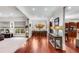 Expansive living area with hardwood floors flowing into the kitchen, featuring a large window at 1109 Pine Grove Ne Ave, Brookhaven, GA 30319