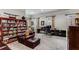 Office space with built-in bookcases, a comfortable leather chair and dual windows at 1109 Pine Grove Ne Ave, Brookhaven, GA 30319