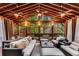 Stunning screened porch with wood ceiling, fans, and ample seating, perfect for relaxing at 1109 Pine Grove Ne Ave, Brookhaven, GA 30319