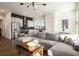 Bright living space featuring modern kitchen, large sectional and recessed lighting at 120 Beardon Se Cir # 2, Atlanta, GA 30316