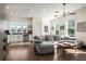Open concept living room and kitchen featuring hardwood floors and natural light at 120 Beardon Se Cir # 2, Atlanta, GA 30316