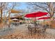 Outdoor seating area with tables, chairs, umbrellas and sail-like structures for shade at 120 Beardon Se Cir # 2, Atlanta, GA 30316